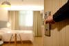 Hotel room credit Pexels