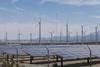 Wind turbines and solar panels on the countryside