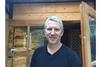 Robin Marriott in front of his garden summer house