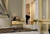 Woman serving order from a hotel room service