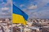 The Ukrainian flag flies above the city of Kharkov