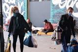 Volunteers help the homeless in London