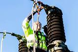Man working on a power cable credit Pexels