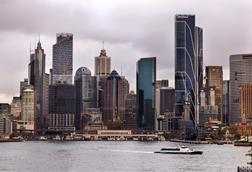 Cityscape of Sydney featuring iconic skyscrapers including Salesforce Tower by the waterfront
