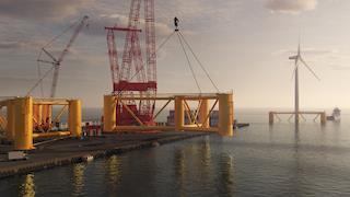 Visualisation of Ocergy's ultra-light turbine foundations loaded out in the water using the same crane as for the turbine assembly