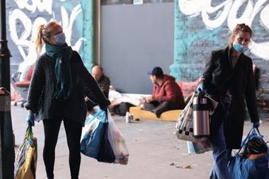 Volunteers help the homeless in London