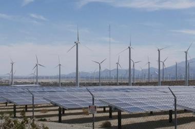 Wind turbines and solar panels on the countryside
