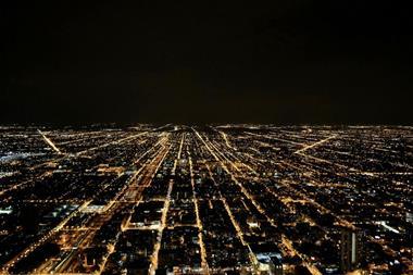 Lighted cityscapes at night time