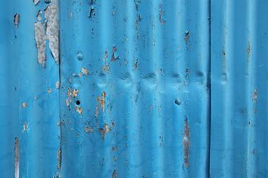 Corrugated iron, scratched, dented