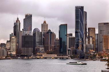 Cityscape of Sydney featuring iconic skyscrapers including Salesforce Tower by the waterfront