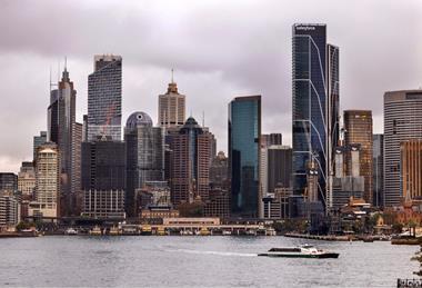 Cityscape of Sydney featuring iconic skyscrapers including Salesforce Tower by the waterfront