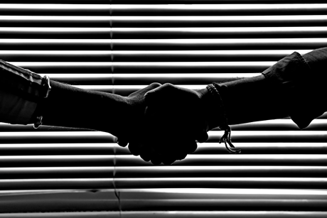 People shaking hands credit Pexels