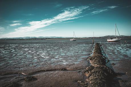 Sewage pipe on beach