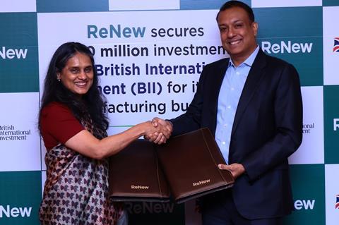 Sumant Sinha, Founder, Chairman & CEO of ReNew, and Shilpa Kumar, MD and Head of India at British International Investment (BII), formalize a landmark $100 million investment ag