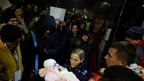 Reuters photo: reports say at least 300,000 Ukrainian refugees have fled the country