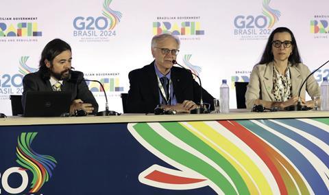 Paulo Picchetti (centre) of the Central Bank of Brazil at a G20 press conference in Sao Paulo