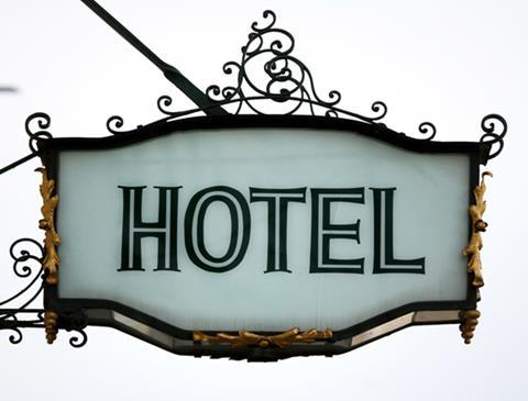 white hotel sign keyimage rs